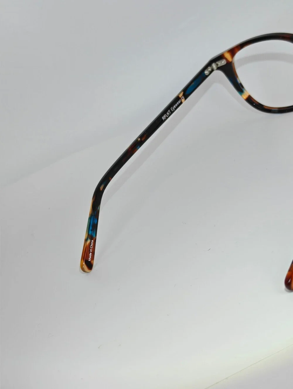 RFLKT. Ona. Women's Specific Eyewear. Round. Blue Amber Tortoise.